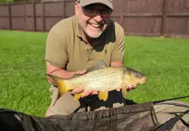 Happy fisherman with Carp.png 81